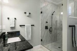 A Walk-In Shower Can Make Bathing Safer in YourSimple luxury bathroom with granite and marble in residential home or hotel. Chattanooga, TN, Home